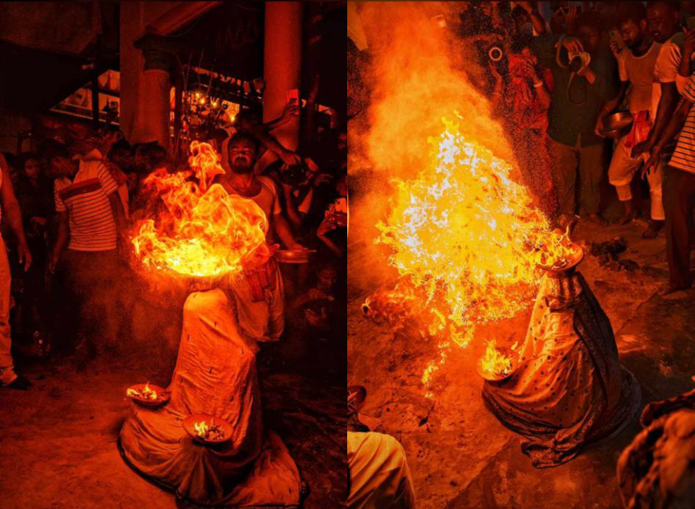 Jagaddhatri Puja,Woman,holds,burning,earthen pots,offer,prayers,Bengali rituals,Dhuno Porano,Jagadhatri Puja,Krishnanagar,West Bengal,Jagadhatri Puja 2023,Krishnanagar Jagadhatri Puja 2023